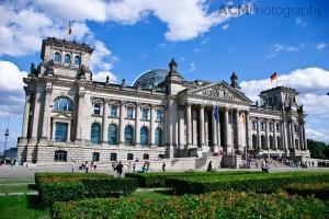 The Reichstag The glass dome on the Reichstag was designed by architect Norman Foster and built to symbolize the reunification of Germany