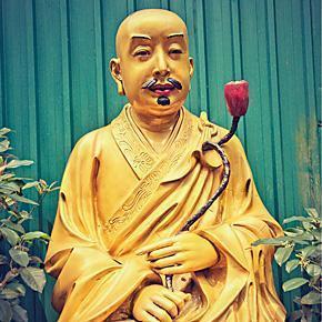 One of the Golden Buddhas lining our path