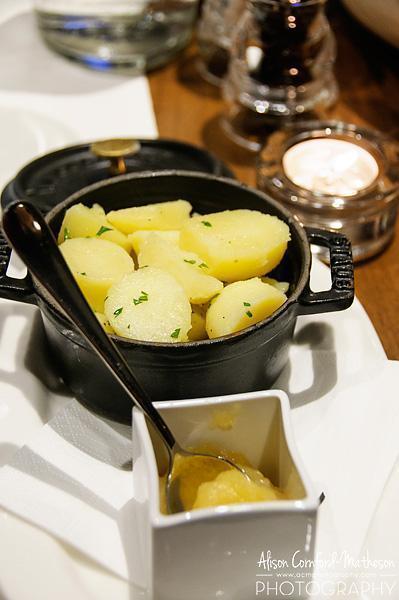 Potatoes and applesauce round out a great Belgian dish
