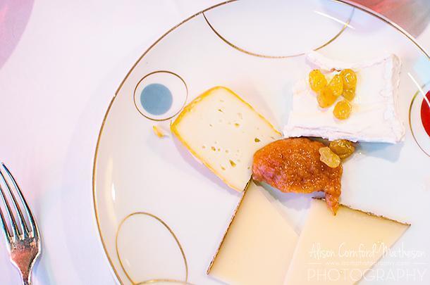 Slices of vieux Comte cheese with other cheeses ‘from here and there.’