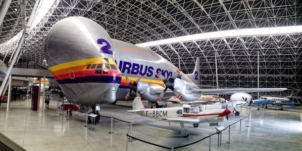 The Super Guppy transport plane dwarfs many of the other planes in the hangar