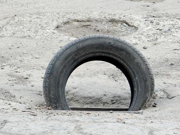 Tyre Highlighting Missing Road Cover, Ukraine
