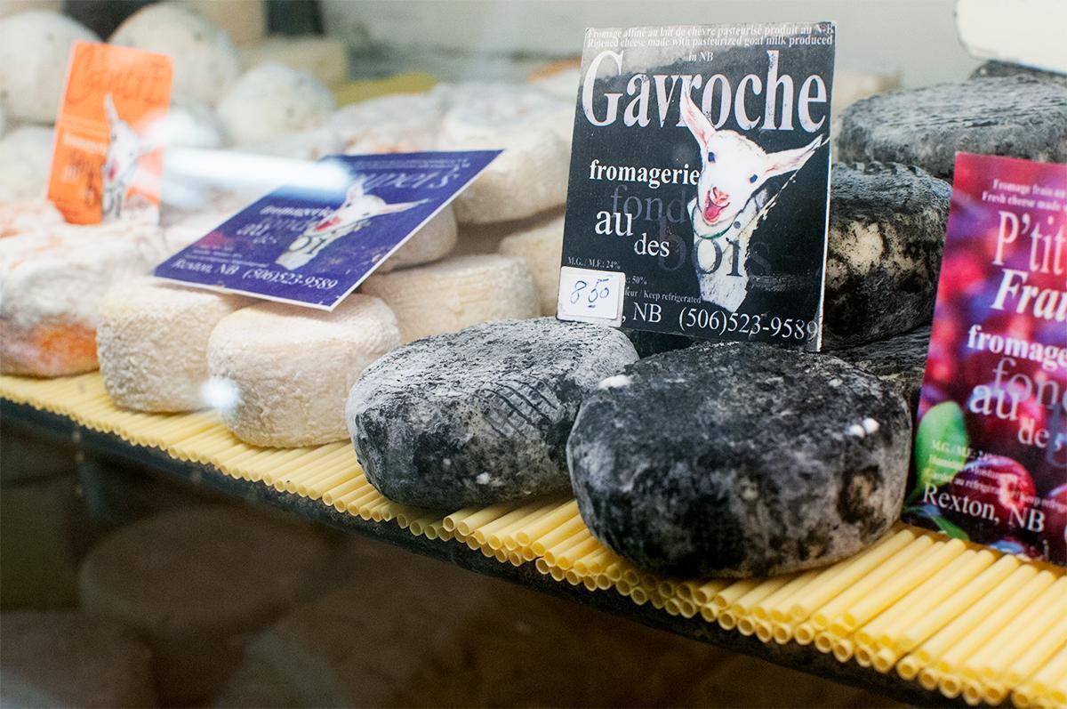Goat cheeses from Fromagerie Au Fond du Bois for sale at the Boyce Farmers' Market in Fredericton, New Brunswick