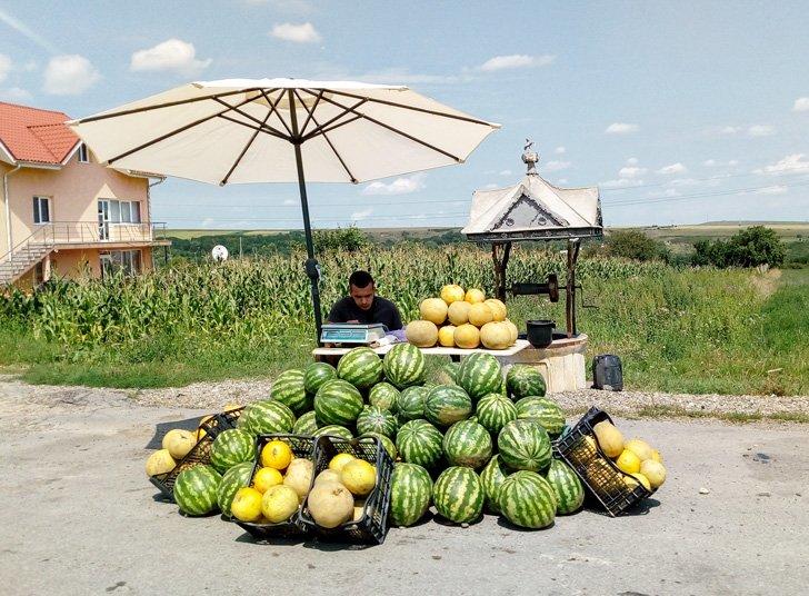 melon seller on a country road in moldova romania