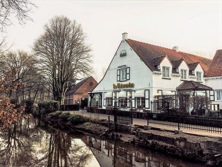 De Watermolen hotel and restaurant sits perched beside the river in Antwerp Province, Belgium.