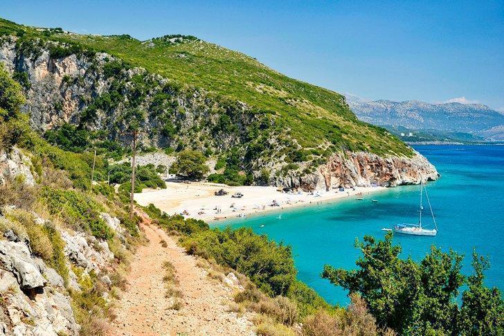 A visit to Gjipe Beach on the Albanian Riviera is one of the top things to do in Albania.